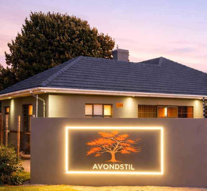 Avondstil Guesthouse exterior at dusk
